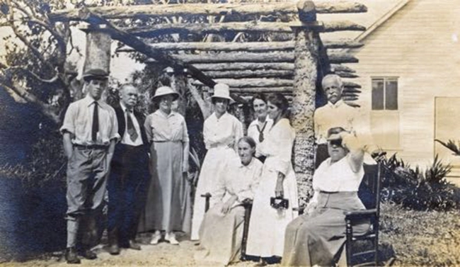 Carlin family around The Carlin House pergola